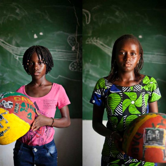 girls from Senegal holding painted bowls