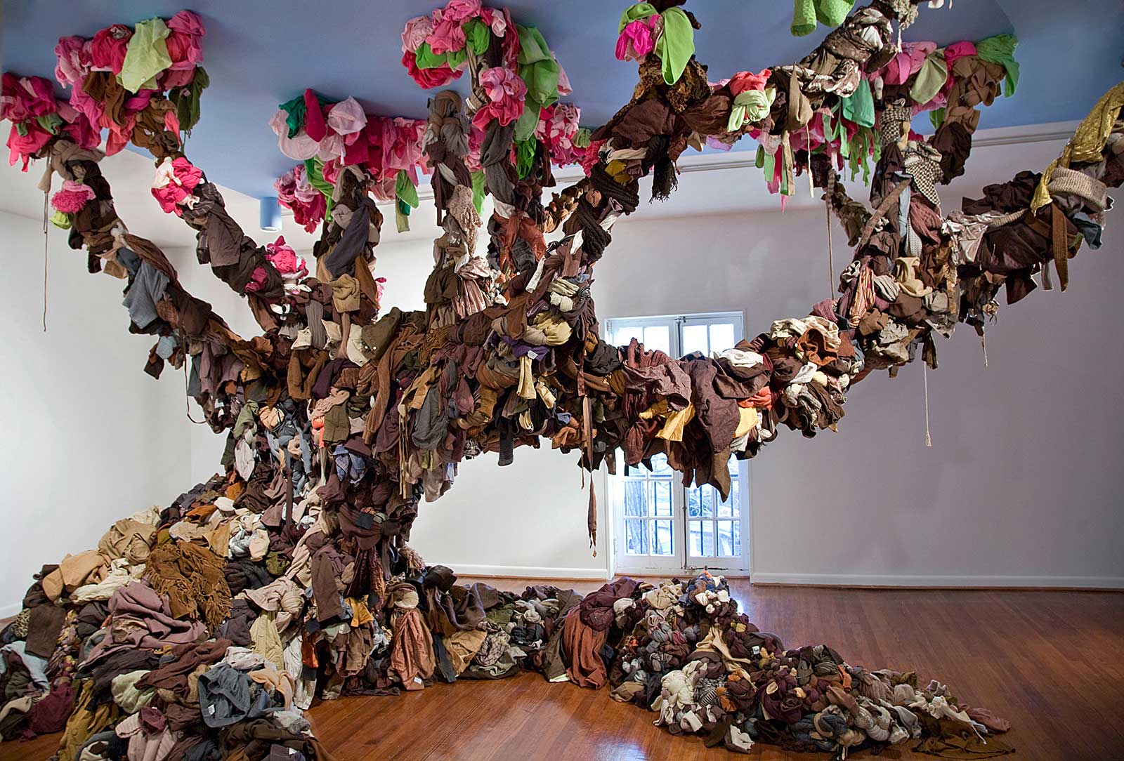 sculpture in form of tree made from discarded textiles