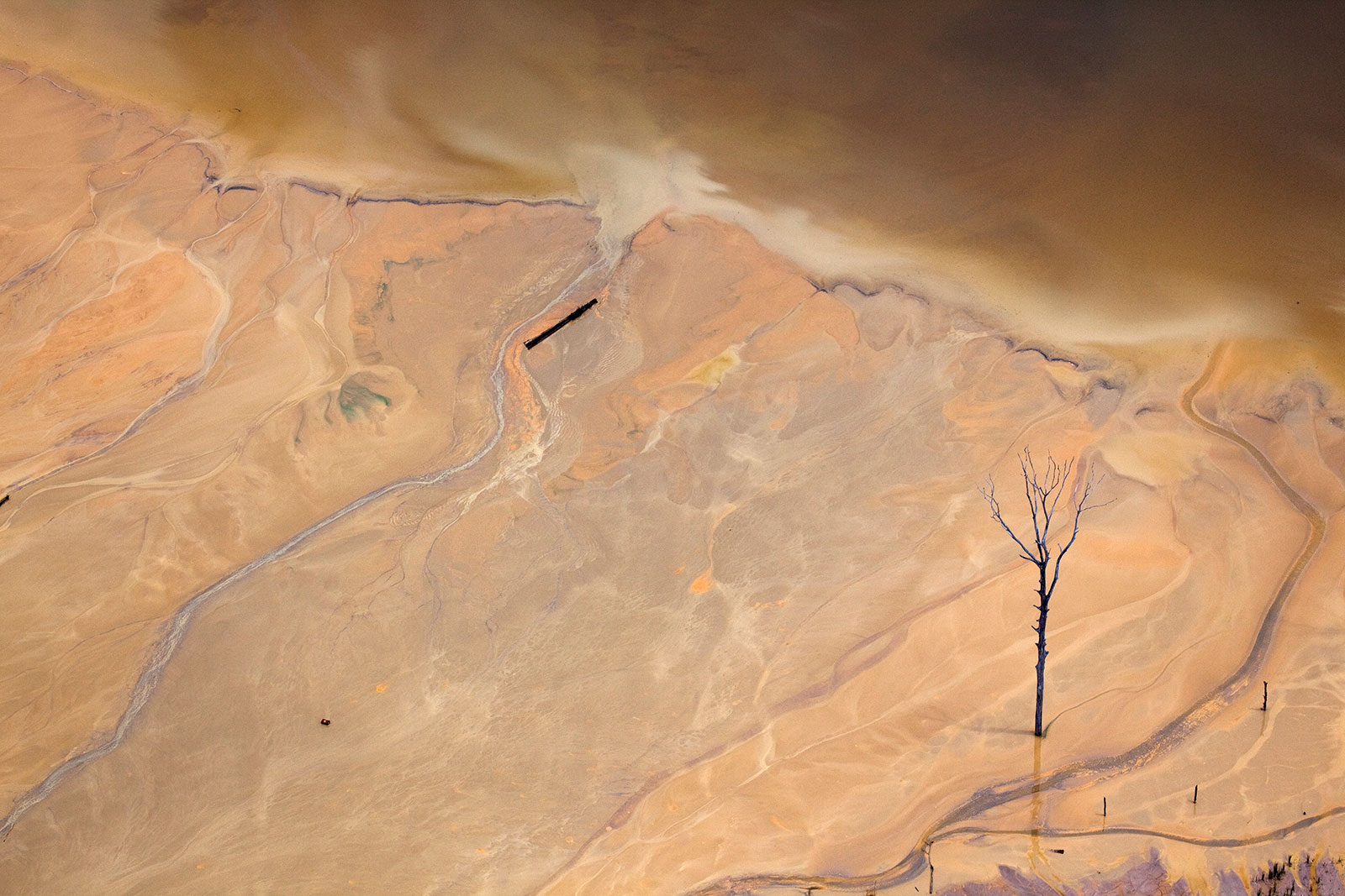 mining residue in flooded rainforest