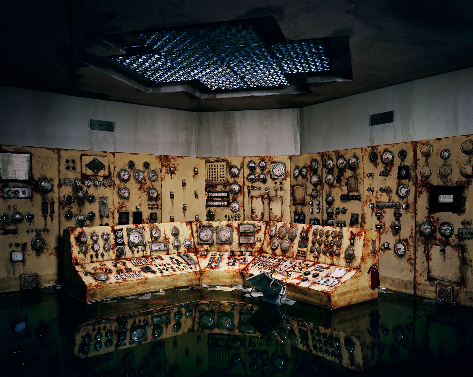 abandoned control room with flooding