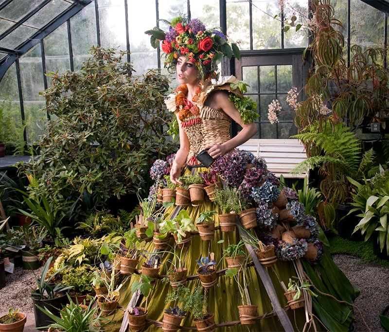 woman wearing dress with flower pots