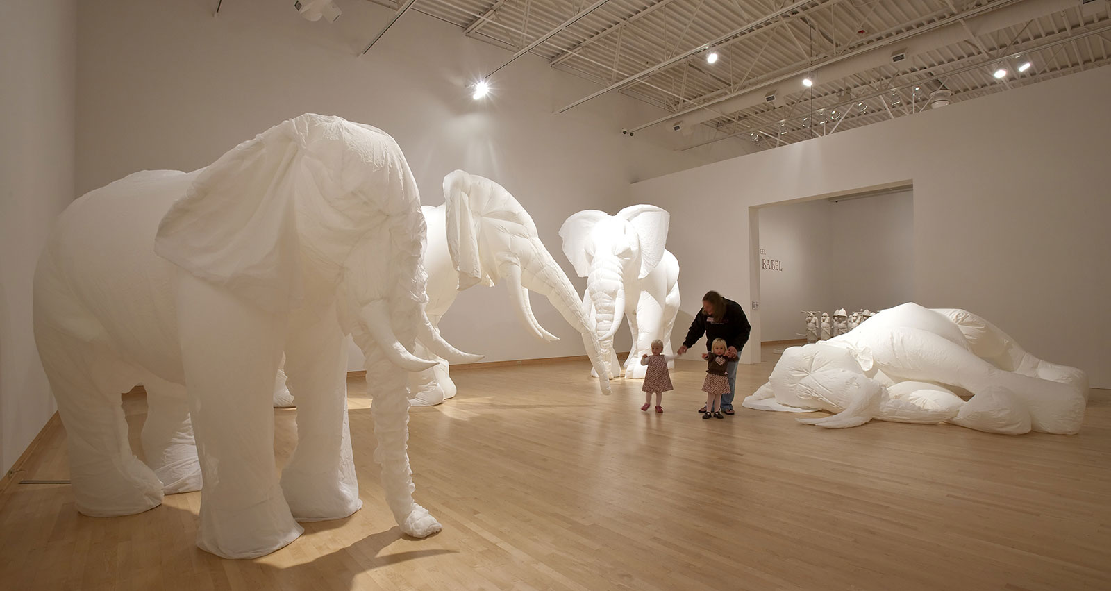 Installation of inflated white elephants