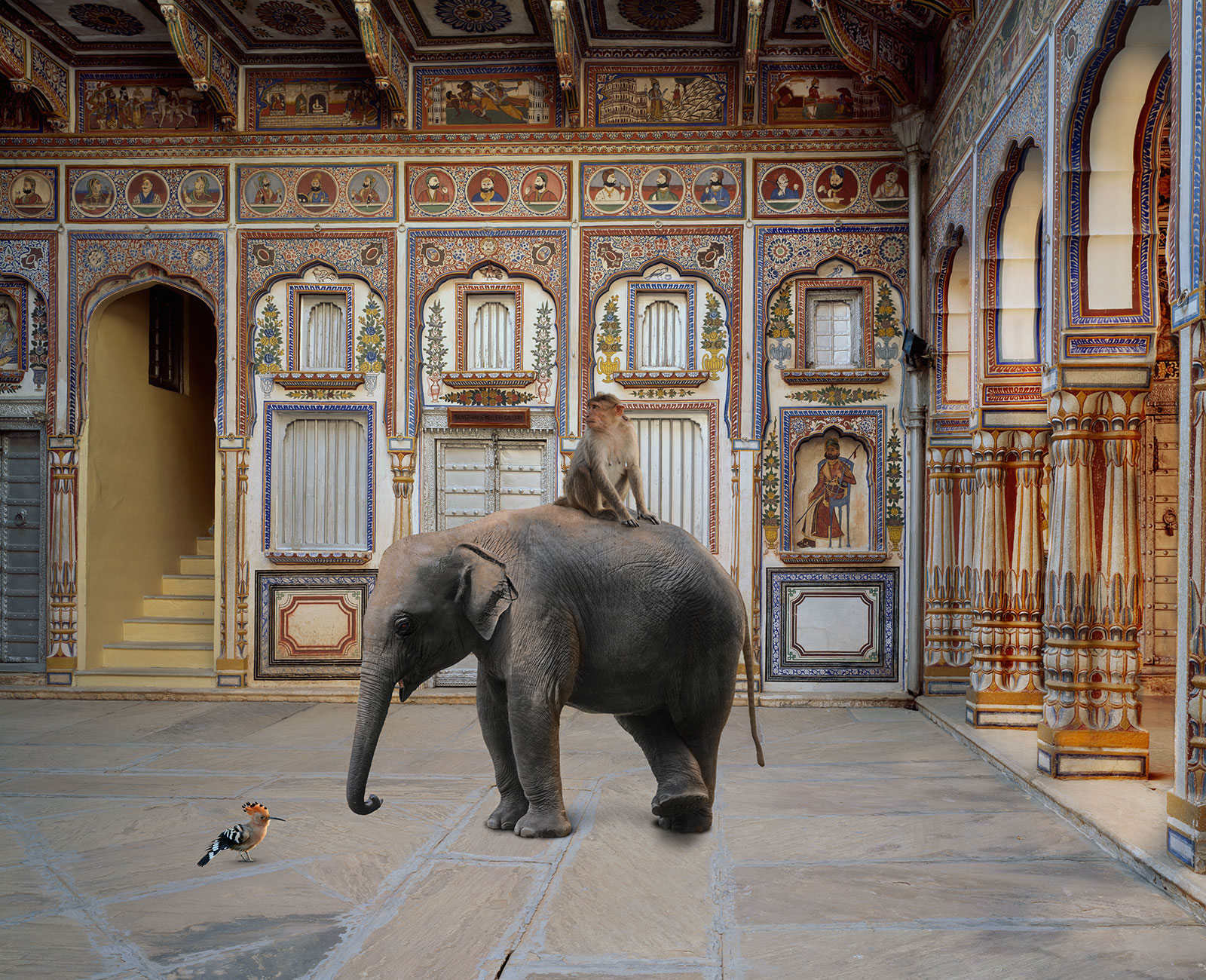 monkey and elephant in ornate Indian temple