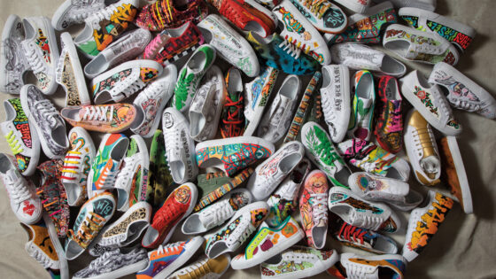 Pile of custom-painted shoes