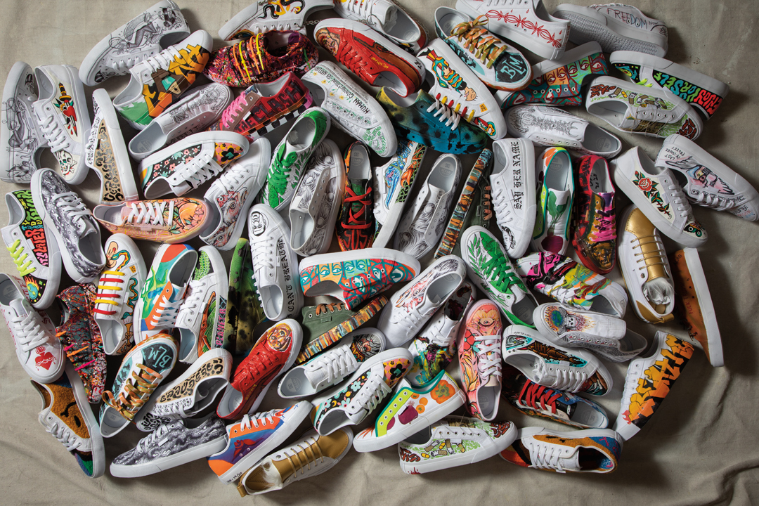 Pile of custom-painted shoes